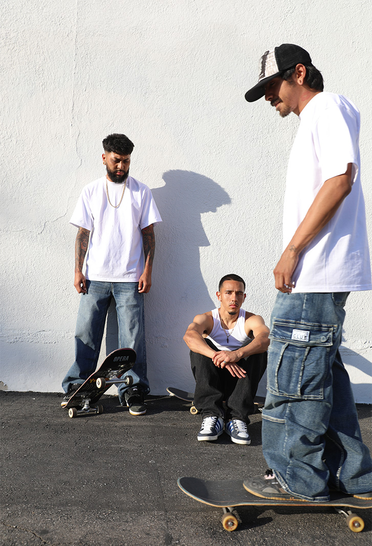 Skaters wearing white tee's and blue jeans